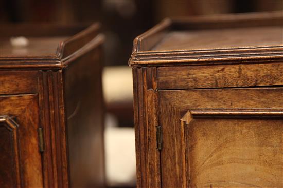 A pair of George III style mahogany bedside cupboards, W.1ft 2.75in.